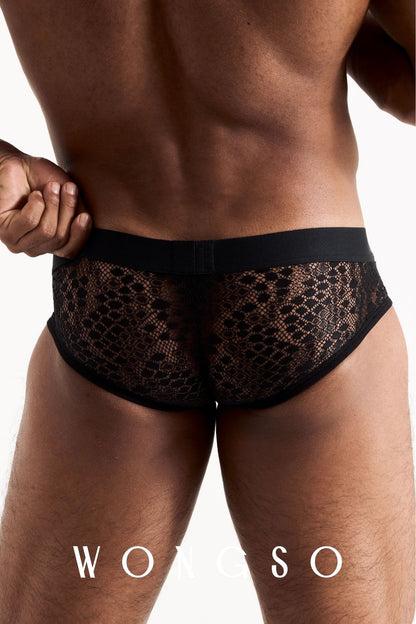 Close-up back view of the leopard print lace briefs, showing fabric texture and fit. Men's lace briefs by WONGSO.