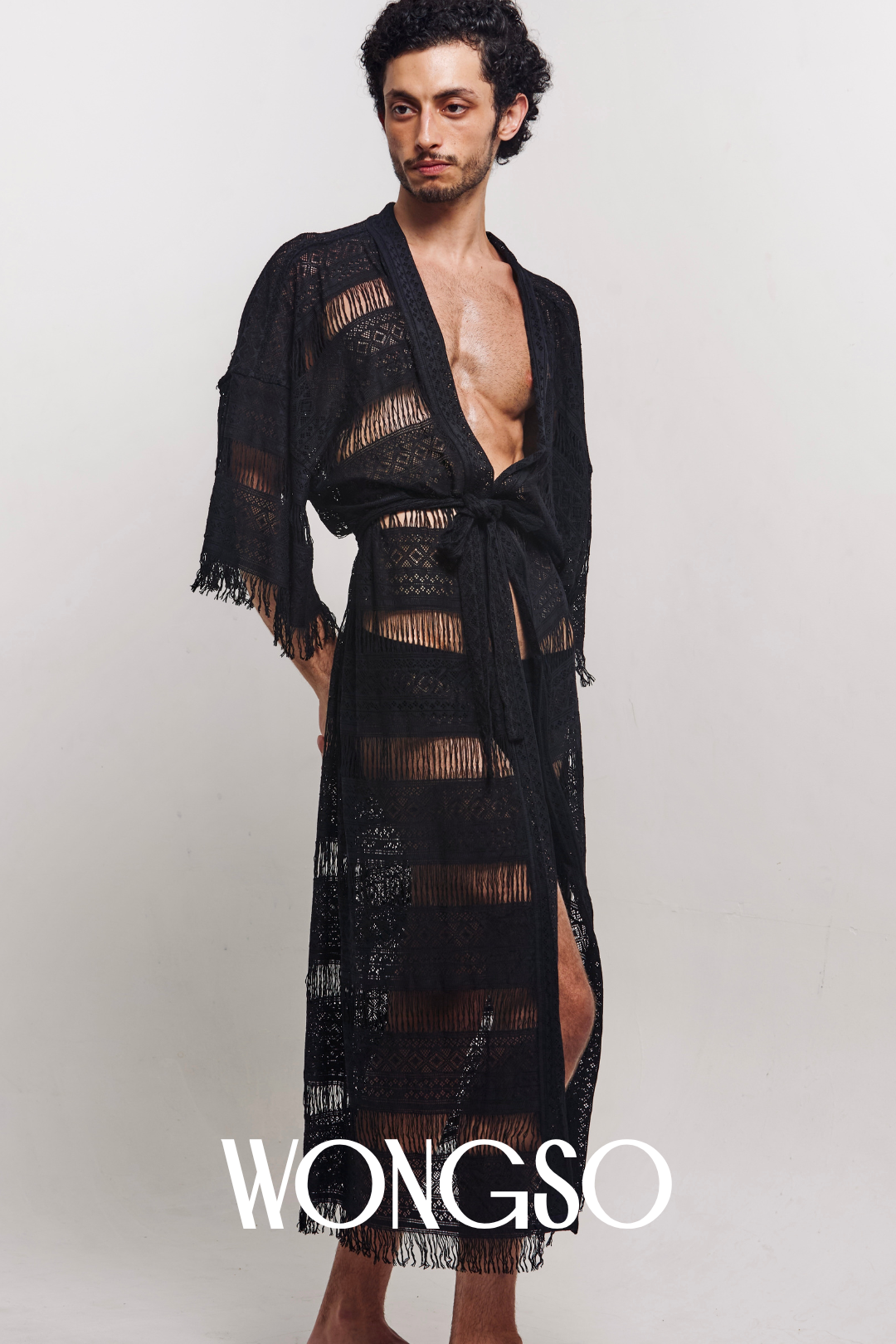 Model wearing sheer fringe lace kimono, front view