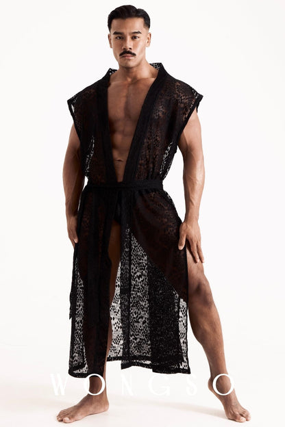 Full body front view of a male model wearing the Libertine High Slit Lace Kimono in Leopard Black by WONGSO. The leopard print lace kimono is cut full-length with a high double side-slit. Men's festival kimono and resort wear.