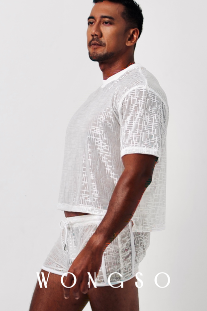 Side View: Back view of boxy cut men’s shirt with slightly cropped hem in silver white