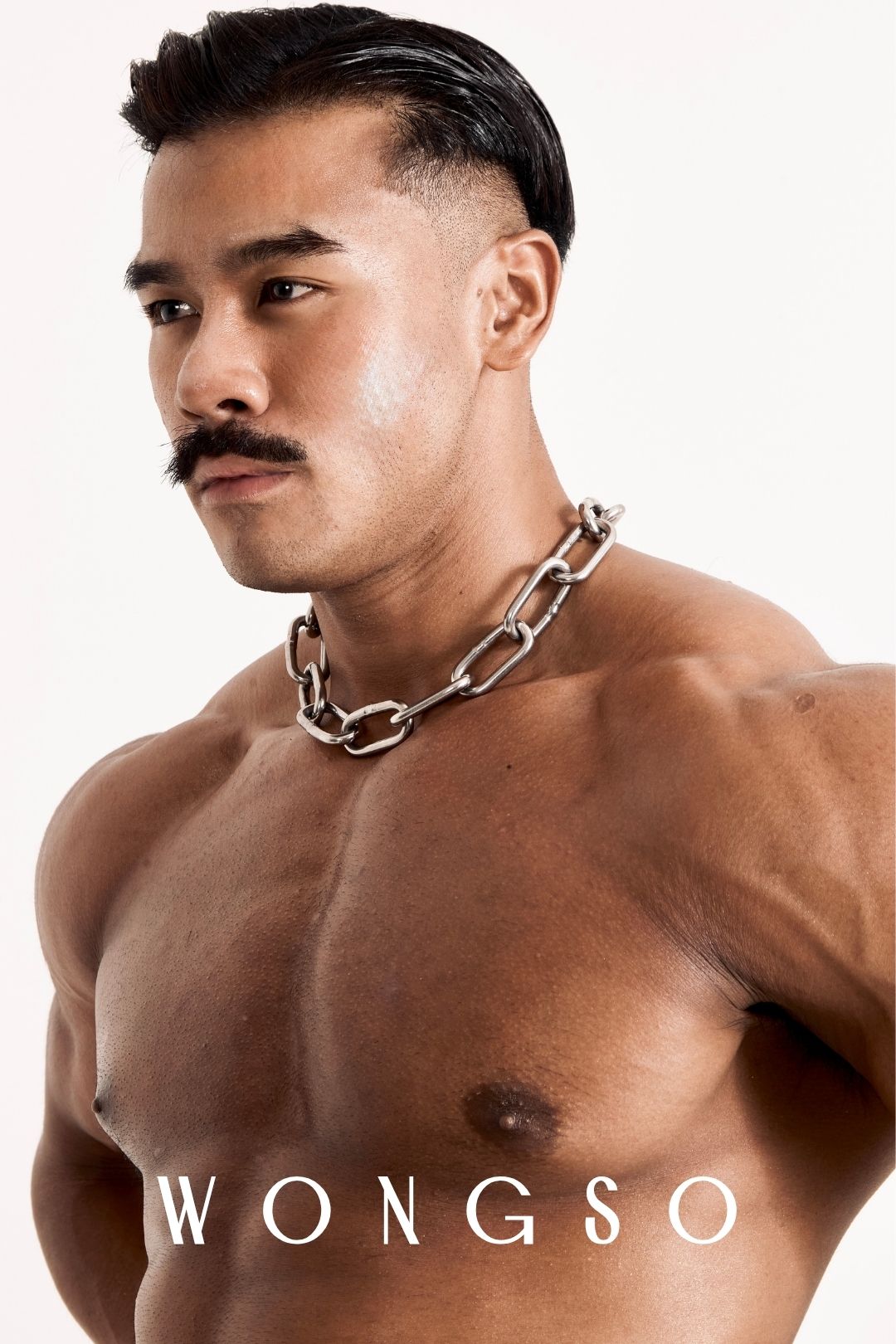 Close-up front view of the Libertine Thick Stainless Steel Chain Necklace by WONGSO, worn against bare chest. Men's heavyweight chain necklace.