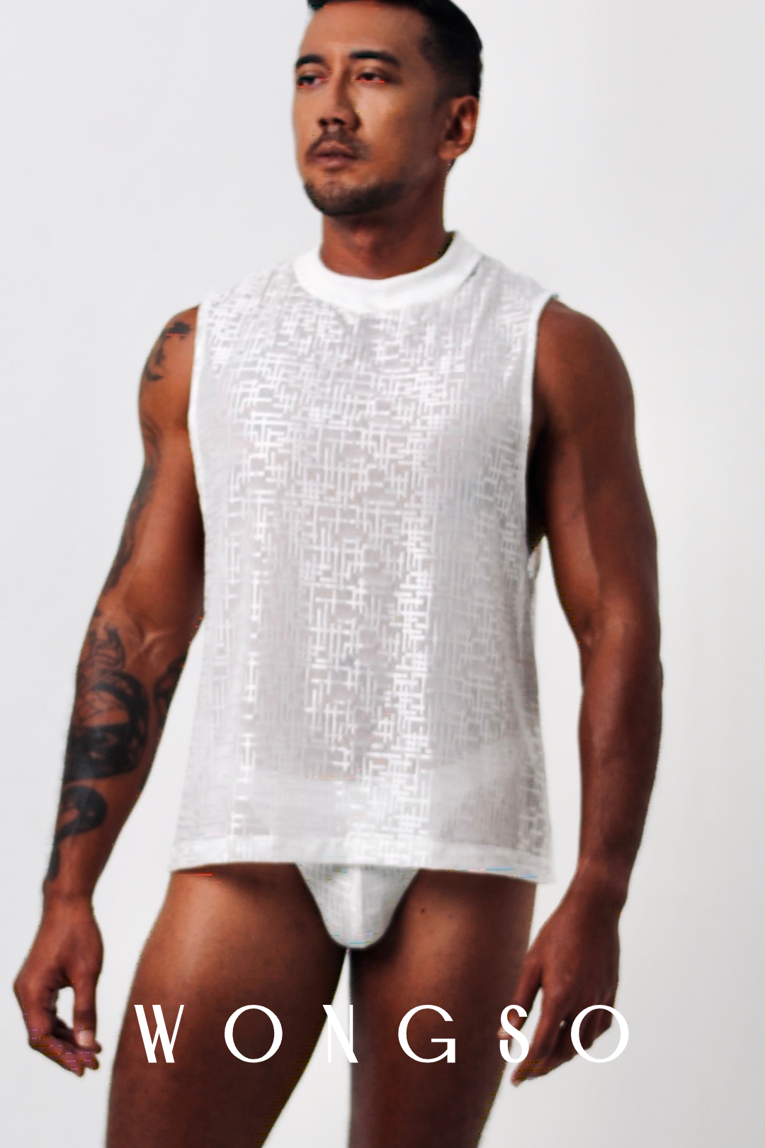Front View: Men’s sheer sleeveless Skank Tank top in silver white from Libertine Collection