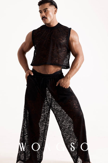 Full body front view of the WONGSO leopard print lace crop top styled with matching Coven pieces. Men's queer festival fashion.