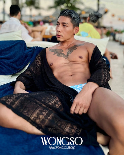 Model in the Black Lace Kimono on a beach-club daybed