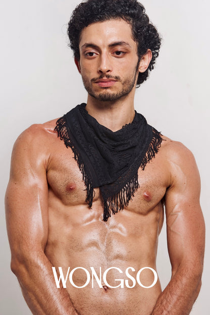 Queer men's WONGSO lace bandana worn around the neck