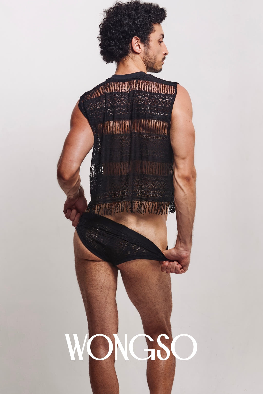 Back view of the WONGSO fringe mesh top highlighting transparency