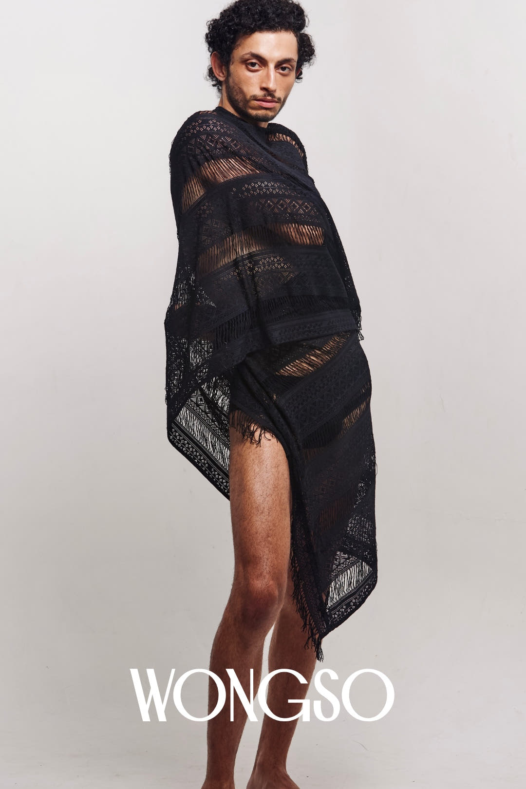 Festival-ready sheer black WONGSO sarong, wrapped
