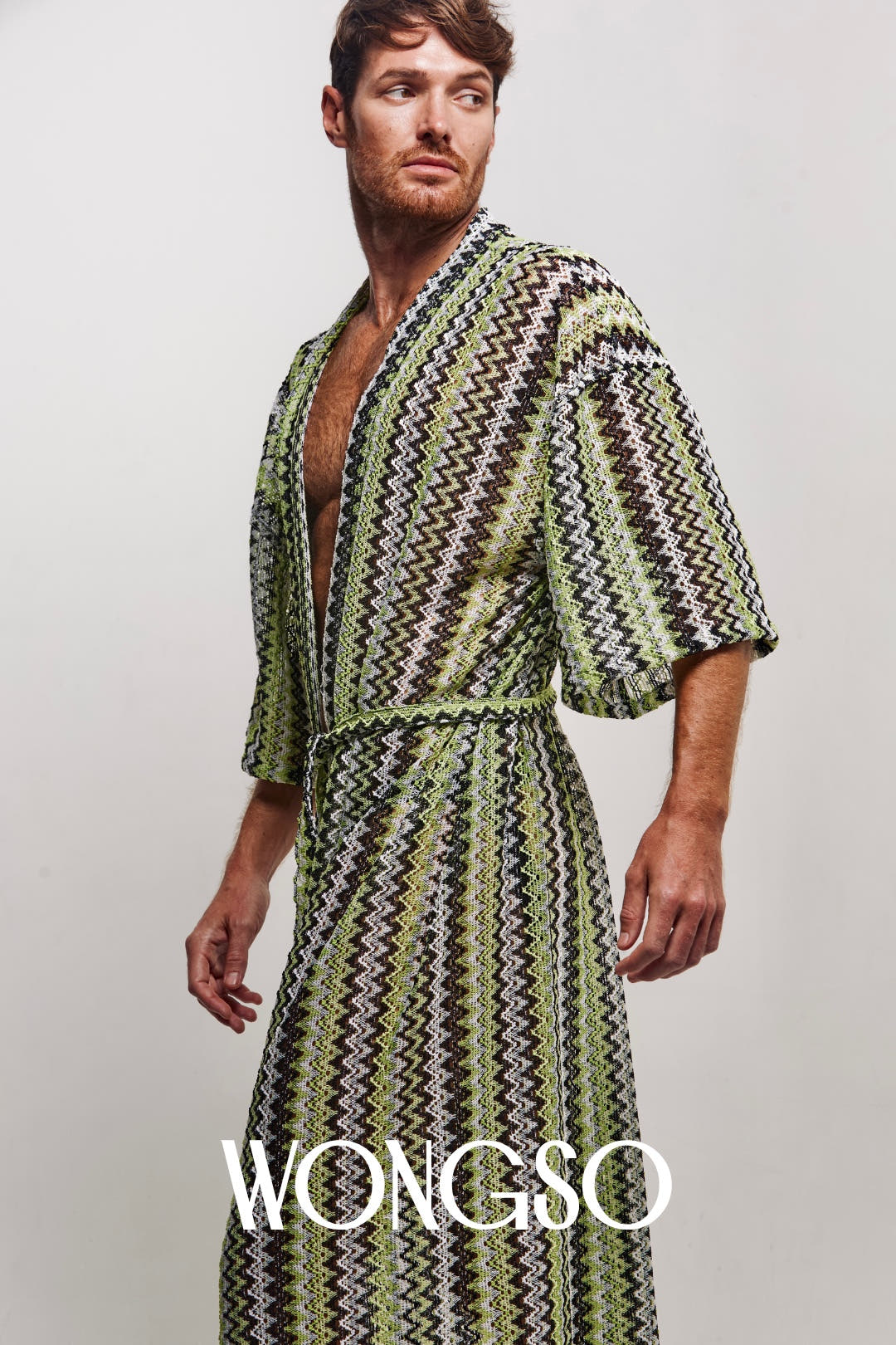 Detail of the green knit texture and open sleeves on WONGSO's kimono