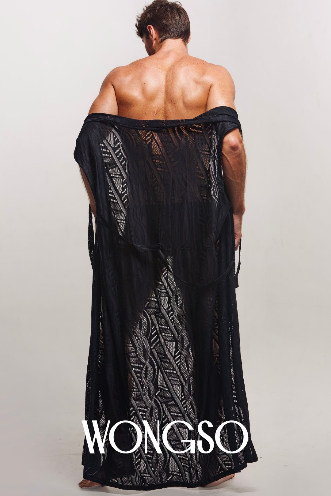 Back view of the WONGSO men's sleeveless kimono with hand-drawn batik in midnight black