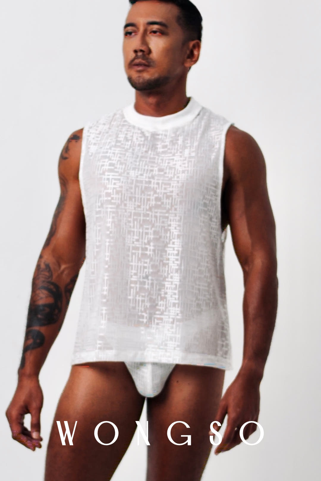Front view of the men's sheer sleeveless WONGSO Skank Tank top in silver white