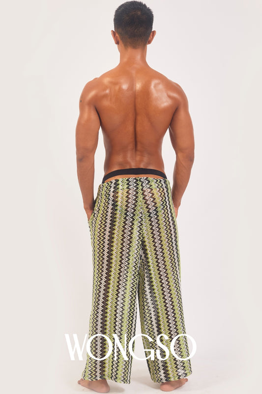 Back view of the WONGSO green knit wide leg pants on a male model
